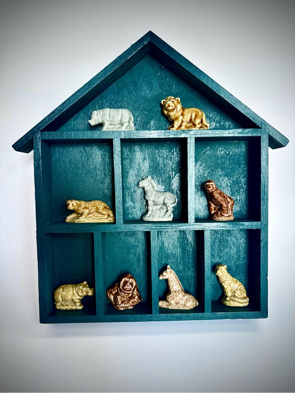 Blue House-Shaped Curio Shelf with Wade England Safari Animals